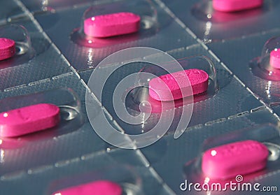 Blister pack of pink pills Stock Photo