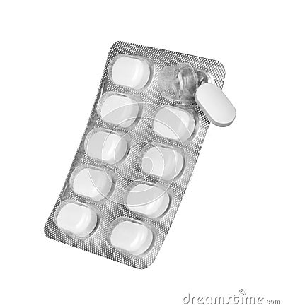 Blister packs pills with a drop down pill on white Stock Photo