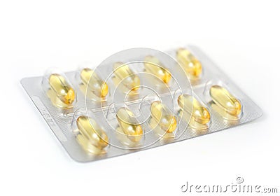 Blister with yellow capsules Stock Photo