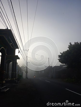 Blitar Indonesia September 17, 2022, foggy and dark weather, prioritize turning on the vehicle lights Editorial Stock Photo