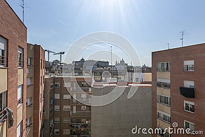 Block patio with facades of houses on a sunny day with the Royal Palace Stock Photo