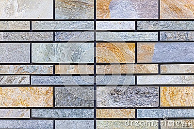 Block pattern of Brown stone cladding wall Stock Photo