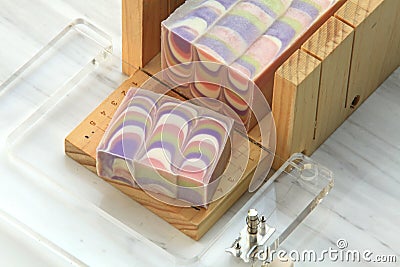 Block of pretty pastel coloured soap on display Stock Photo