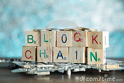 Blockchain cryptocurrency concept. Wood blocks say block chain w Stock Photo