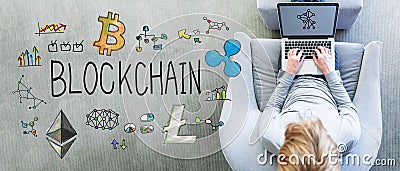 Blockchain with man using a laptop Stock Photo