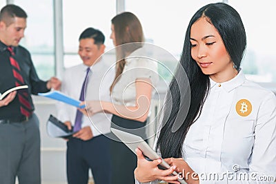 Blockchain technology. Bitcoin cryptocurrency. Asian business people Stock Photo