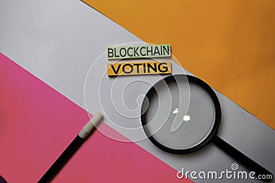 Blockchain Voting text on sticky notes with color office desk concept Stock Photo