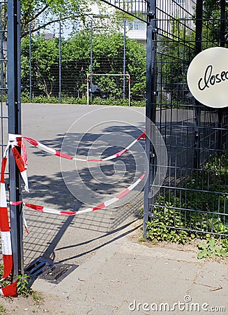 Blocked, closed public playground, football ground, coronavirus lockdown Stock Photo