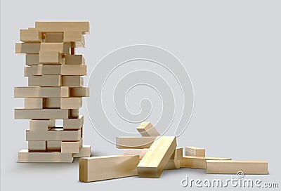 Blocks wood game jenga on gray background. Stock Photo