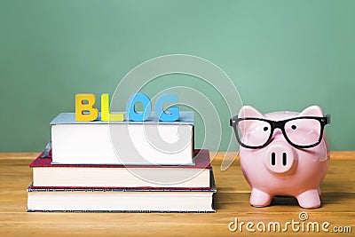 Blog theme with pink piggy bank with chalkboard Stock Photo