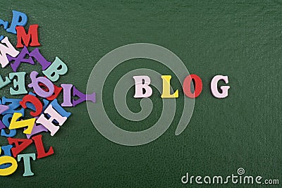 BLOG word on green background composed from colorful abc alphabet block wooden letters, copy space for ad text. Learning Stock Photo