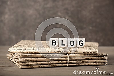 Blog word and newspapers Stock Photo