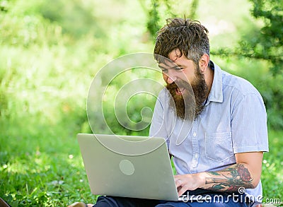 Blogger becoming inspired by nature. Man bearded with laptop nature background. Writer or blogger write post for social Stock Photo
