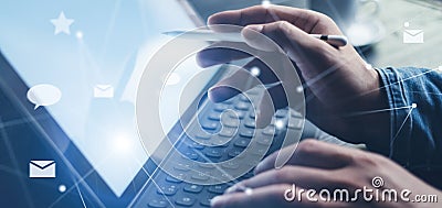 Blogger using mobile touch pad for sending at social network message.Closeup view of male hands using stylus pen for Stock Photo