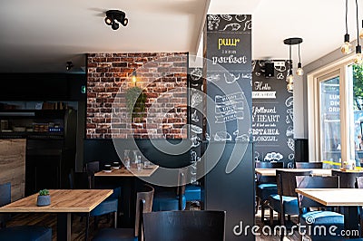Blokzijl, Overijssel, The Netherlands, Renovated interior design of a local restaurant at the banks of the canal Editorial Stock Photo