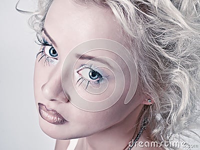 Blond beauty portrait with original make up Stock Photo