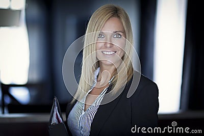 Blond Confident Businesswoman Smiling Stock Photo