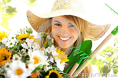 Blond girl and gardening tools Stock Photo