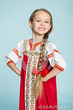 Blond girl in the Russian folk costume Stock Photo