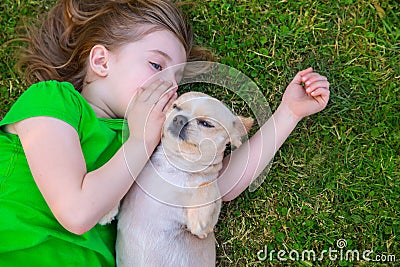 Blond happy girl with her chihuahua doggy portrait Stock Photo