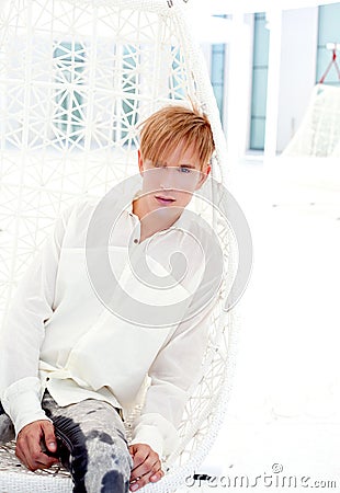 Blond modern man portrait in summer terrace Stock Photo