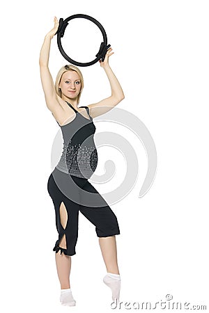 Blond pregnant woman doing pilates. Stock Photo