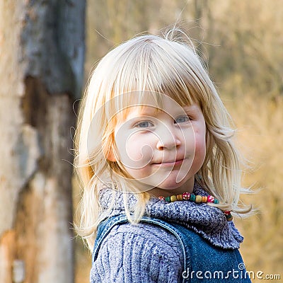 Blond smart looking child Stock Photo