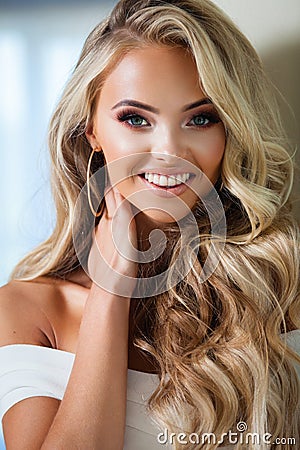 Blond smiling woman Stock Photo