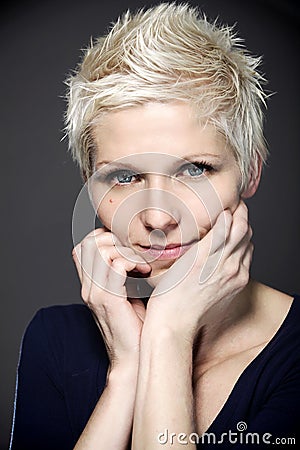 Blond woman with blue contact lenses Stock Photo