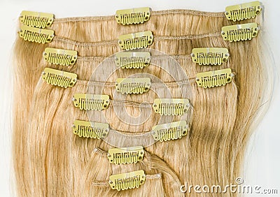 Blonde clip in hair extensions - stock image Stock Photo