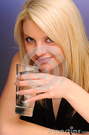Blonde Girl with Glass of Water Stock Photo