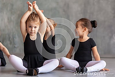 Girls stretch before a ballet Stock Photo