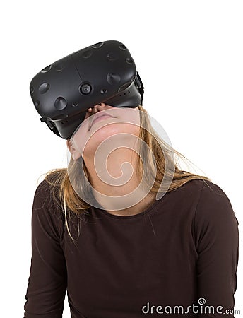 Blonde girl using VR - virtual reality headset Stock Photo