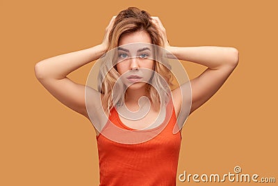 Blonde handsome girl tries ignore annoying noise Stock Photo