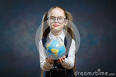 Blonde Little Schoolgirl Hold World Globe in Hand Stock Photo
