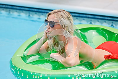 Blonde in pool Stock Photo