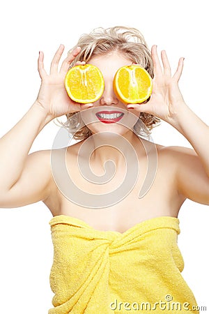 Blonde woman with orange Stock Photo