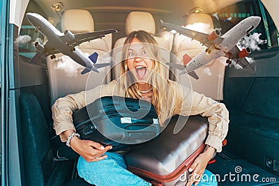 Woman is ready to travel with baggages in hand Stock Photo