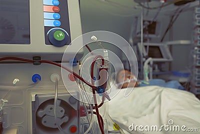 Blood filtration of patient in bed Stock Photo