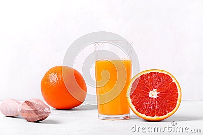 Blood orange juice freshly squeezed in the drinking glass Stock Photo