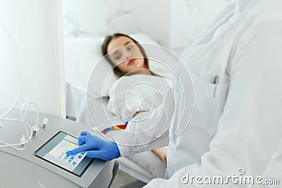 Blood Ozone Therapy. Woman At Blood Transfusion Treatment Stock Photo