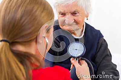 Blood pressure checking Stock Photo