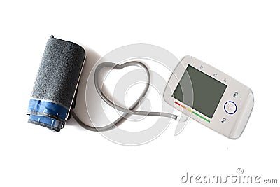 Blood pressure gauge with cuff and monitor connected with a tube Stock Photo