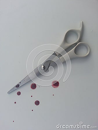 Blood splatter and scissors Stock Photo