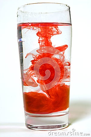 Blood swirls in glass Stock Photo