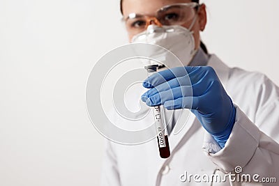 Blood test tube in doctor hand, Mers-CoV Coronavirus test Positive label in hospital blood test tube for analysis. 2019-nCoV virus Stock Photo