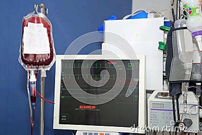 Blood transfusion, monitor of vital signs Stock Photo