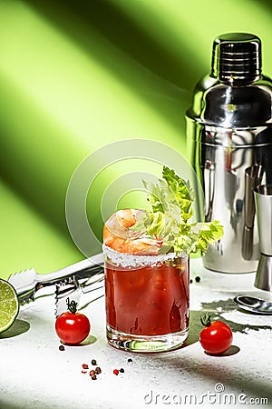 Bloody Caesar alcoholic cocktail drink, version of Bloody Mary with tomato juice, vodka, clam broth, celery, hot sauce and ice in Stock Photo