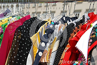 Blouses on hangers Stock Photo