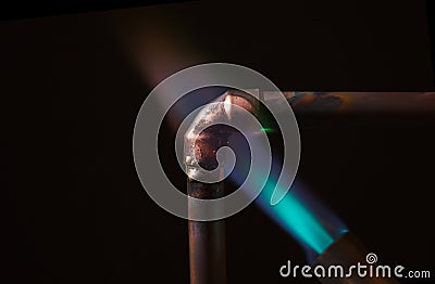 Blow Torch Flame and Copper Pipe Stock Photo